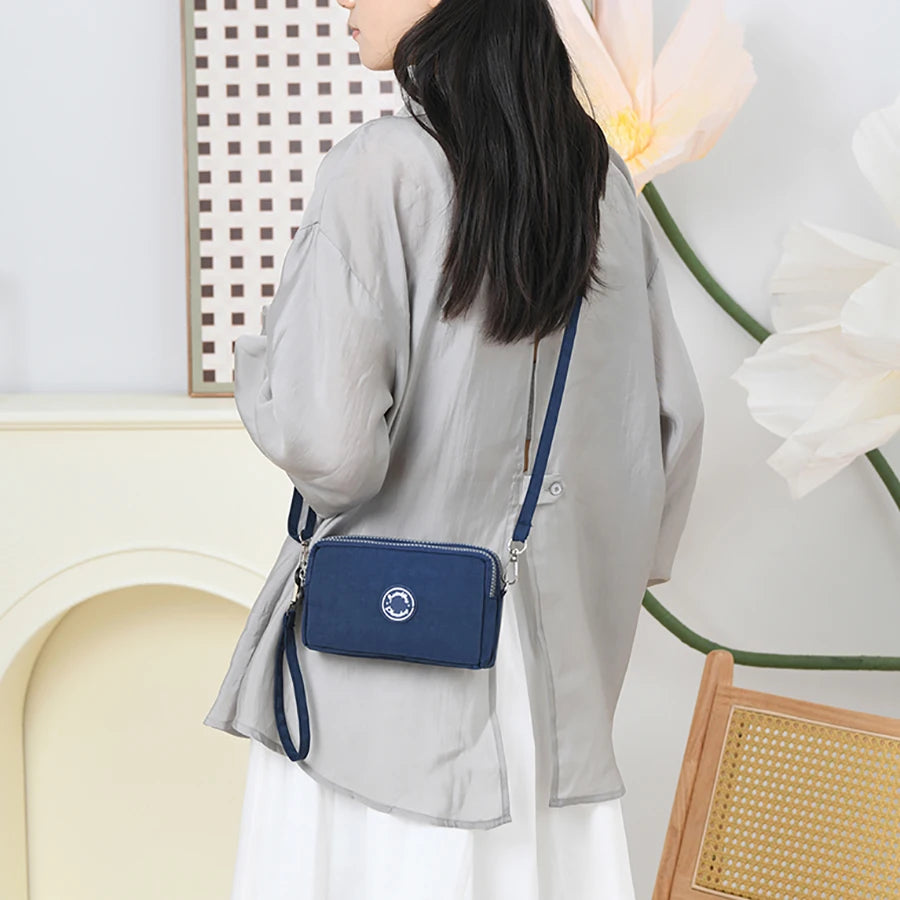 Fashion solid color triple zipper large capacity ladies crossbody travel portable popular zipper coin purse phone wallet